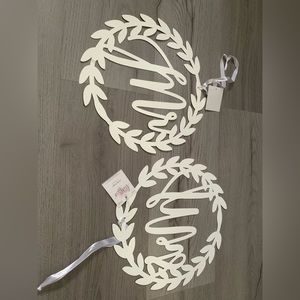 Mr and mrs white chair signs.